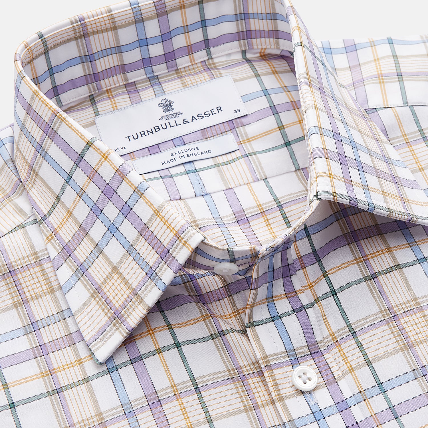 View 2 of product The Turnbull & Asser Colourful Garden Multi Check Cotton Regular Fit Mayfair Shirt, featuring a collar and buttoned cuffs, is laid flat on a white surface.