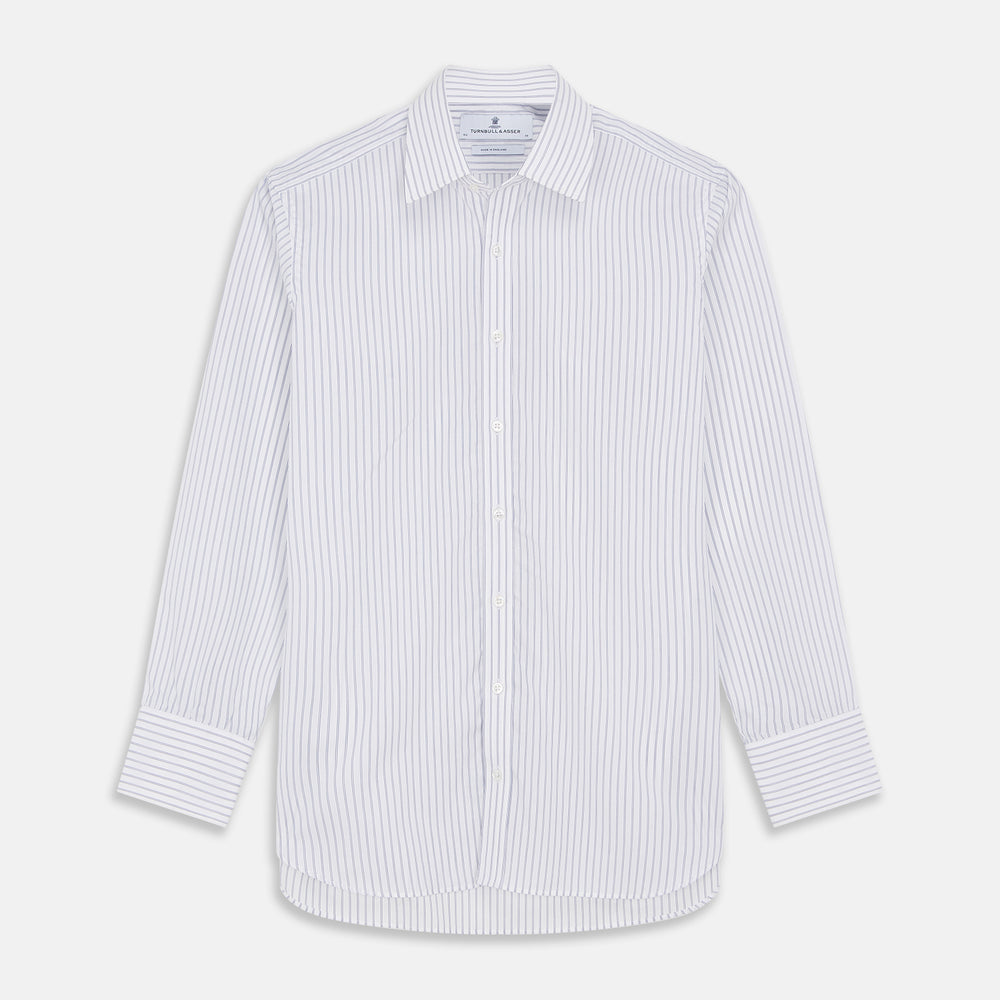 The Turnbull & Asser White and Blue Halo Stripe Cotton Regular Fit Mayfair Shirt features thin vertical stripes, a classic collar, and cuffed long sleeves—an essential men's formal shirt shown laid flat on a white background.