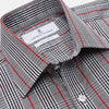 View 3 of product The Turnbull & Asser Black Prince of Wales Check Cotton Regular Fit Mayfair Shirt, featuring a button-up design and pointed collar, is a classic men's wardrobe staple in black, white, and red check.