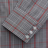 View 2 of product The Turnbull & Asser Black Prince of Wales Check Cotton Regular Fit Mayfair Shirt, featuring a button-up design and pointed collar, is a classic men's wardrobe staple in black, white, and red check.