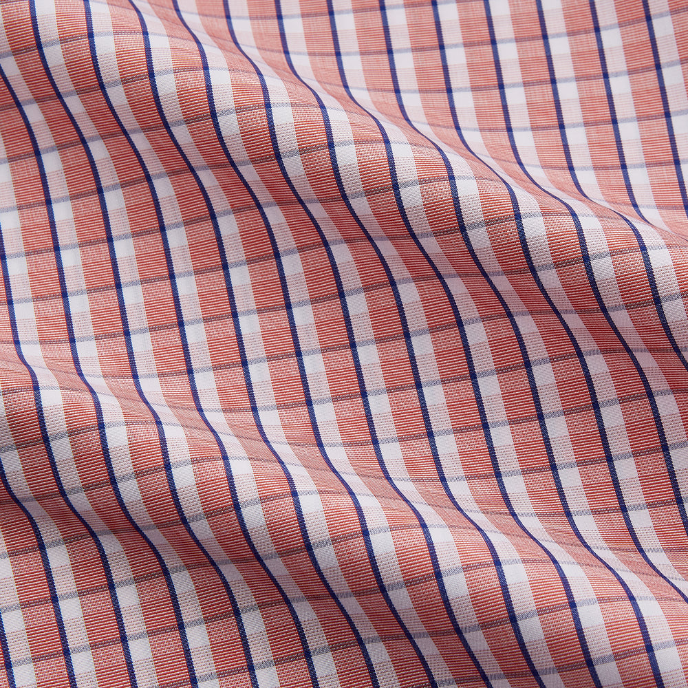 The Turnbull & Asser Orange and White Check Cotton Regular Fit Mayfair Shirt features a classic Mayfair collar and white buttons, shown laid flat on a white background.