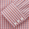 View 2 of product The Turnbull & Asser Orange and White Check Cotton Regular Fit Mayfair Shirt features a classic Mayfair collar and white buttons, shown laid flat on a white background.