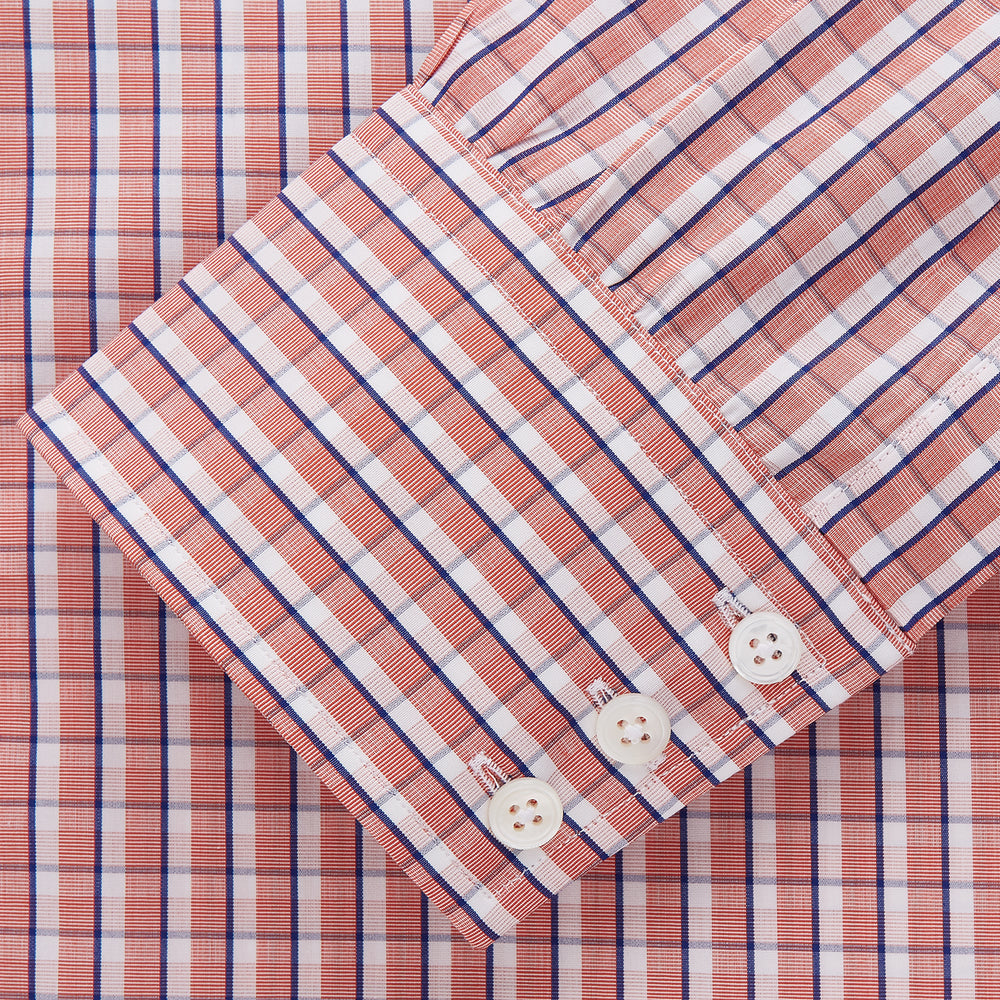 The Turnbull & Asser Orange and White Check Cotton Regular Fit Mayfair Shirt features a classic Mayfair collar and white buttons, shown laid flat on a white background.
