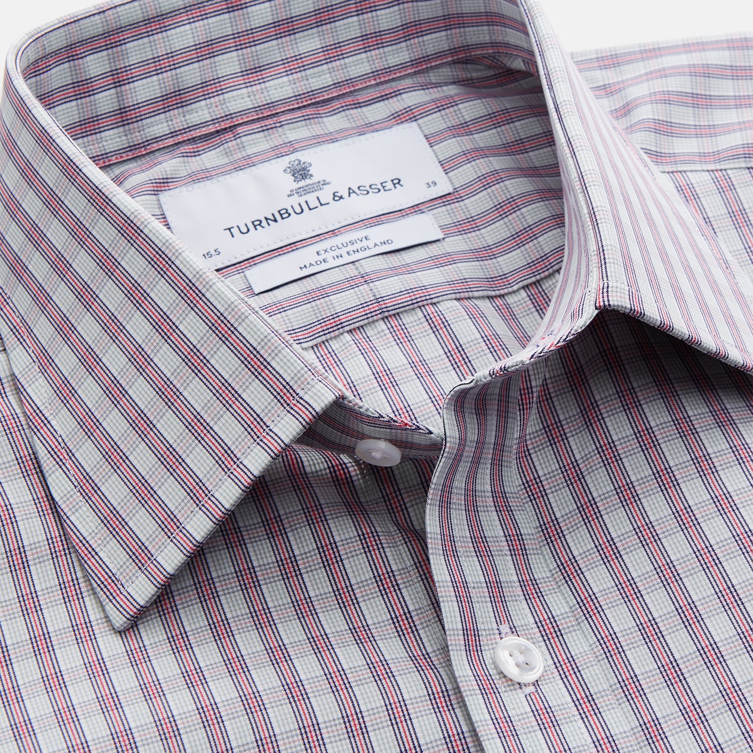 View 2 of product The Turnbull & Asser Red and Blue Check Cotton Regular Fit Mayfair Shirt, featuring long sleeves, a collar, and cuffs, is a classic addition to any men's wardrobe.