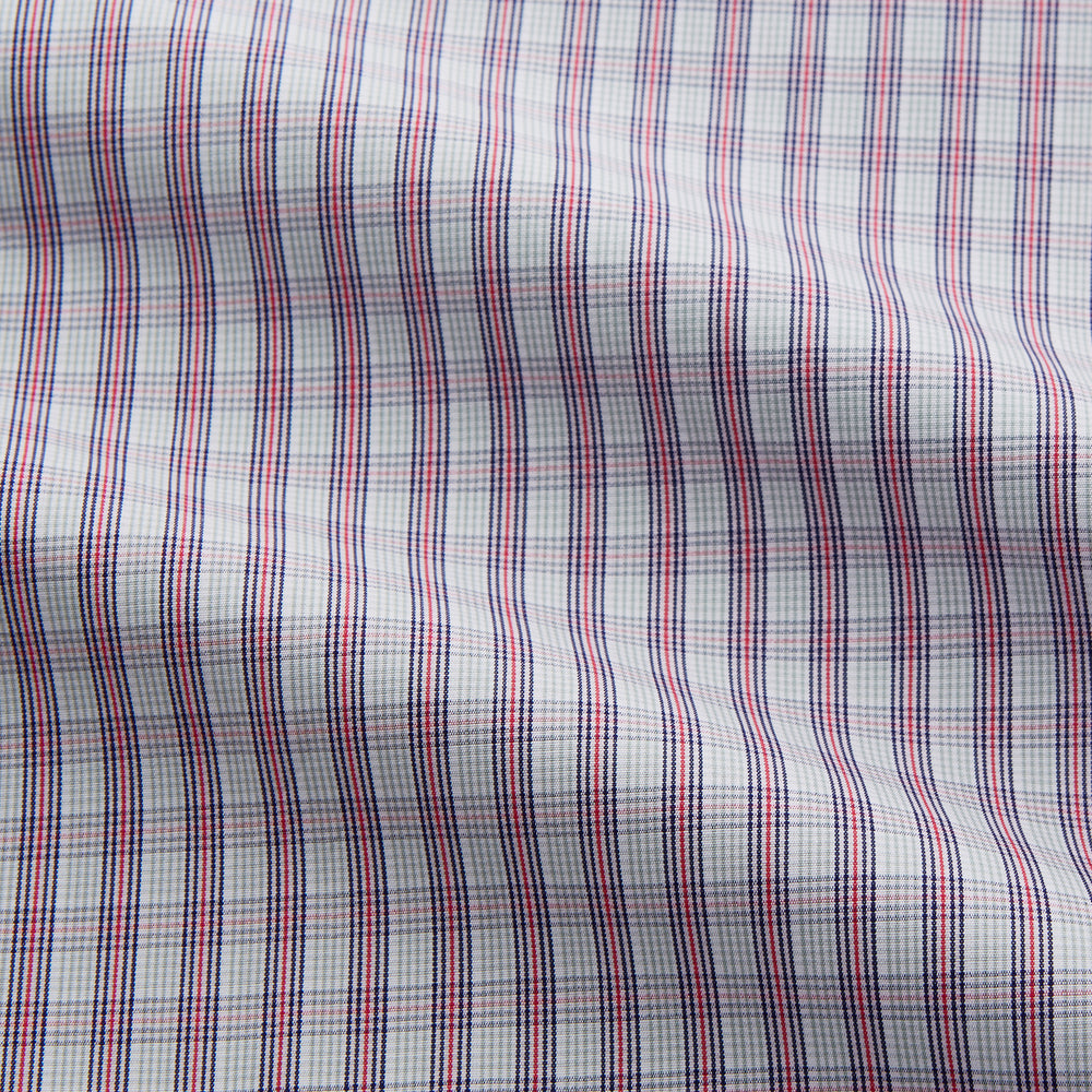 The Turnbull & Asser Red and Blue Check Cotton Regular Fit Mayfair Shirt, featuring long sleeves, a collar, and cuffs, is a classic addition to any men's wardrobe.