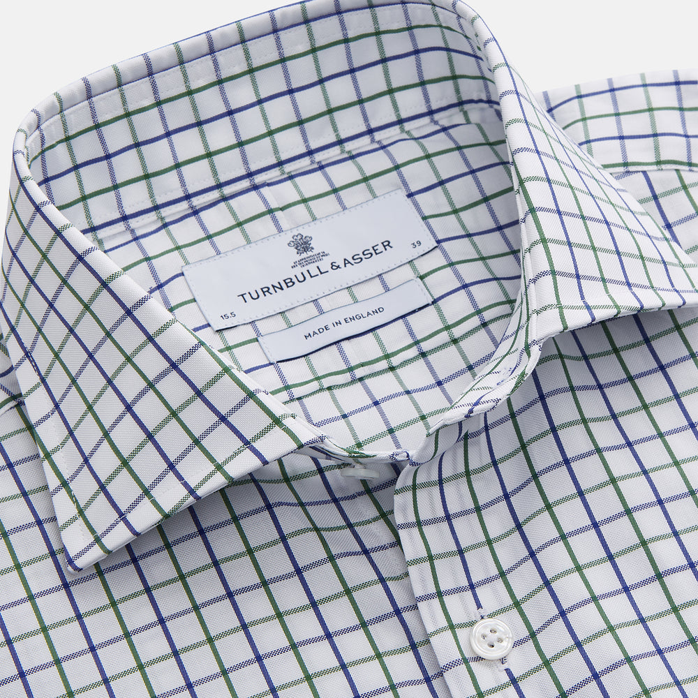 The Turnbull & Asser Green and Blue Check Cotton Tailored Fit Shelton Shirt for men features a crisp white base with a green and blue check pattern, shown laid flat on a white background.