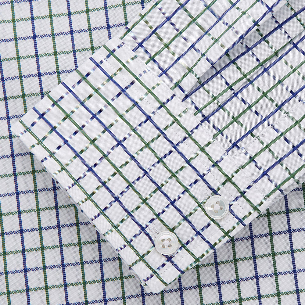 The Turnbull & Asser Green and Blue Check Cotton Tailored Fit Shelton Shirt for men features a crisp white base with a green and blue check pattern, shown laid flat on a white background.