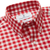 View 2 of product The Turnbull & Asser Burgundy Multi Check Cotton Weekend Fit Hayne Shirt is a long-sleeve style with a Dorset collar and red-and-white gingham checks, shown laid flat on a white background.