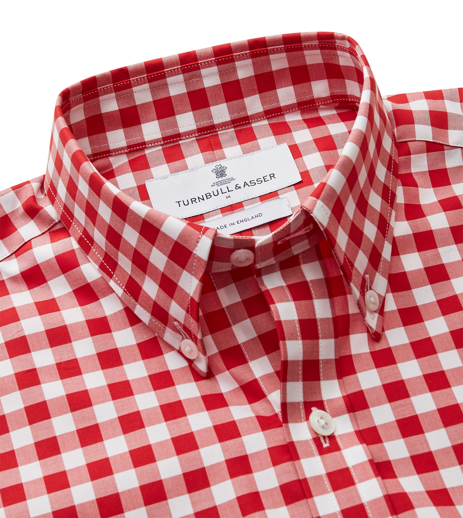 View 2 of product The Turnbull & Asser Burgundy Multi Check Cotton Weekend Fit Hayne Shirt is a long-sleeve style with a Dorset collar and red-and-white gingham checks, shown laid flat on a white background.