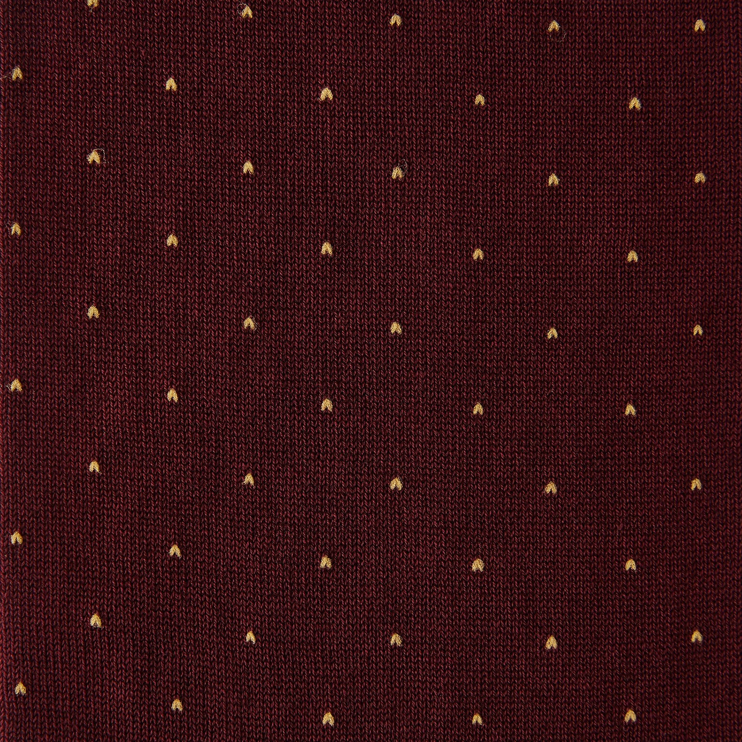 View 2 of product Turnbull & Asser’s Burgundy and Gold Polka Dot Cotton Mid-length Socks, shown on a white background, feature small gold dots for a stylish touch to elevate any office outfit.
