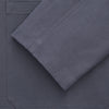 View 3 of product The Turnbull & Asser Charcoal Grey Organic Cotton Blend Remy Chore Jacket features a collar, button-up front, and four front pockets—two chest, two waist—making it a versatile must-have for any men's wardrobe.