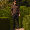 View 2 of product Turnbull & Asser Charcoal Tailored Drawstring Trousers in wool flannel, featuring an elastic waistband, straight legs, and side pockets, shown laid flat on a white background.