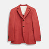 View 1 of product The Turnbull & Asser Clay Red Cotton 3 Button Blazer, tailored in Italy, features notched lapels, three front pockets, sleeve button details, and brown buttons, shown against a plain white background.