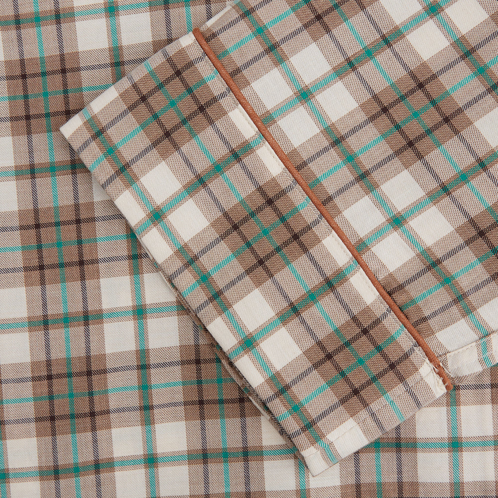 The Green and Oatmeal Cotton Hyde Pyjamas Set by Turnbull & Asser features a modern fit and comfortable drawstring waist trousers—perfect cotton sleepwear for relaxing nights.