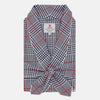 View 1 of product The Navy and Red Archive Check Cotton Dressing Gown by Turnbull & Asser features a shawl collar, tied waist, and classic check pattern. Made in England—ideal for travel.