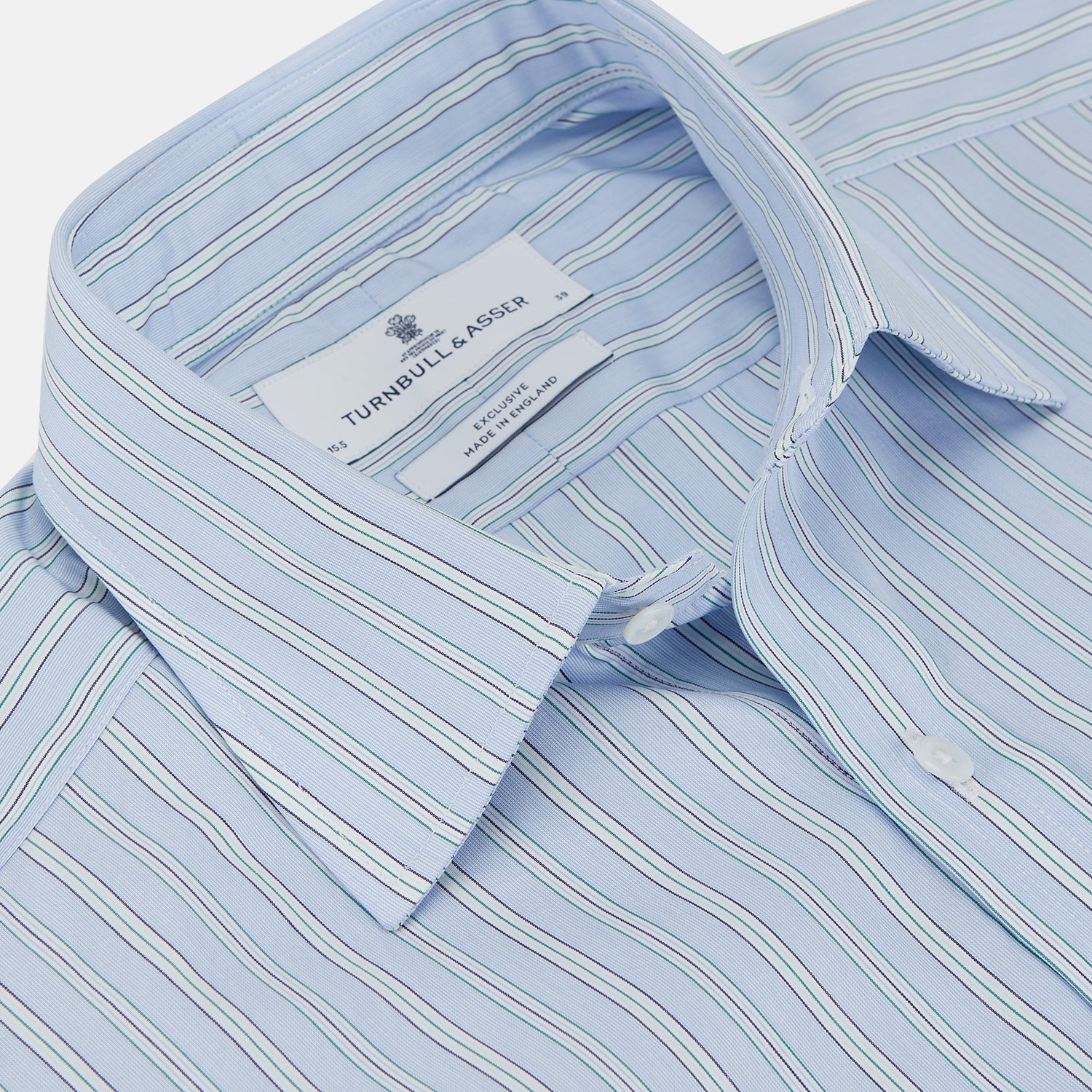 View 2 of product The Turnbull & Asser Blue and White Fine Stripe Shirt features a T&A collar, 3-button cuffs, and a regular fit with long sleeves—ideal for smart-casual looks, displayed against a plain white background.