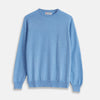 View 1 of product The Turnbull & Asser Sky Blue Fine Cashmere Crew Neck Jumper features long sleeves with ribbed cuffs and hem, shown against a plain white background.
