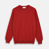 View 1 of product The Turnbull & Asser Red Cashmere Crewneck Jumper features long sleeves, ribbed cuffs and hem, showcasing classic Scottish knitwear elegance. Displayed on a white background.