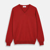View 1 of product The Turnbull & Asser Red Cashmere V-Neck Jumper features long sleeves and ribbed cuffs and hem, shown laid flat on a white background.