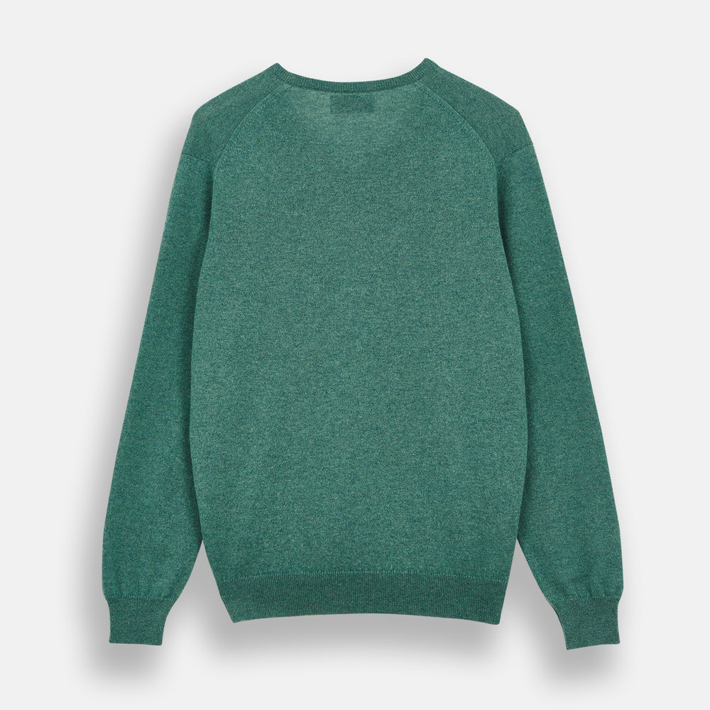 The Turnbull & Asser Green Cashmere V-Neck Jumper features long sleeves, ribbed cuffs and hem, and is styled in classic Scottish knitwear, shown flat against a white background.