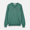 View 1 of product The Turnbull & Asser Green Cashmere V-Neck Jumper features long sleeves, ribbed cuffs and hem, and is styled in classic Scottish knitwear, shown flat against a white background.
