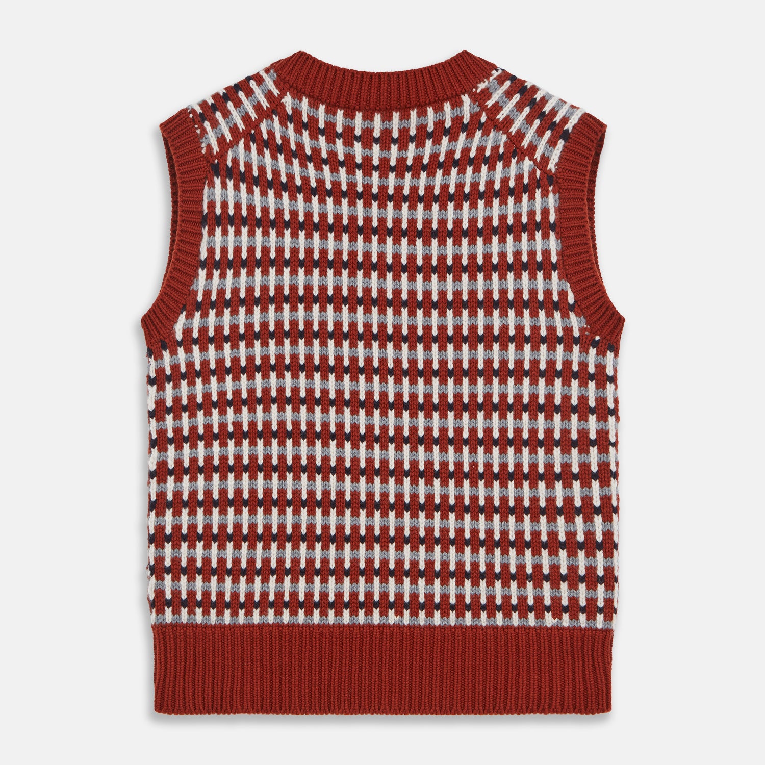 View 5 of product The Rust Knitted Cashmere Slipover by Turnbull & Asser is a sleeveless V-neck vest in red, white, and dark brown houndstooth, inspired by Welsh knitwear with solid red ribbed trim at the collar, armholes, and hem.