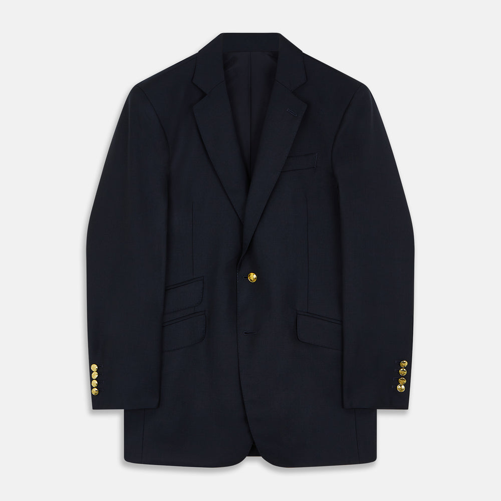 The Turnbull & Asser Navy Plain Wool Single Breasted Blazer features brass buttons on the front and cuffs, notched lapels, and multiple front pockets, shown laid flat against a white background.