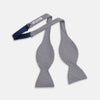 View 2 of product The Turnbull & Asser Black Houndstooth Silk Bow Tie features a classic black and white pattern, displayed against a plain white background—an elegant choice to elevate any formal ensemble.
