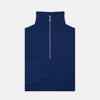 View 1 of product Turnbull & Asser’s Blue Half-Zip Cashmere Jumper with a high collar is neatly folded on a white background, its left sleeve partially tucked under—ideal for winter layering.