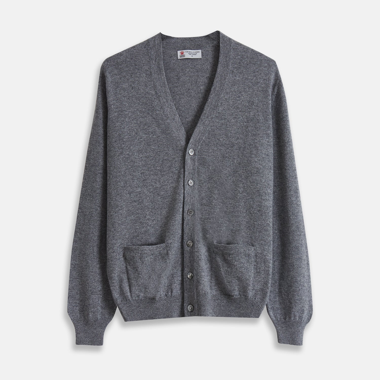 View 1 of product The Grey Fine Cashmere Cardigan by Turnbull & Asser is a long-sleeve, button-up sweater with two front pockets, shown on a white background.