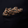View 3 of product The Copper Fine Floral Print Silk Pocket Square by Turnbull & Asser features a refined floral pattern in silk, with the brand’s name discreetly displayed in one corner—a perfect choice for those who appreciate elegant pocket squares.