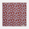 View 1 of product The Red Abstract Feather Print Silk Pocket Square by Turnbull & Asser features a dense purple and black feather pattern on red silk, accented with a discreet brand label—an elegant formal accessory.