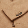View 2 of product The Camel Merino Wool Blazer by Turnbull & Asser features a classic notch lapel, two front pockets, and two dark buttons. Shown against a white background.