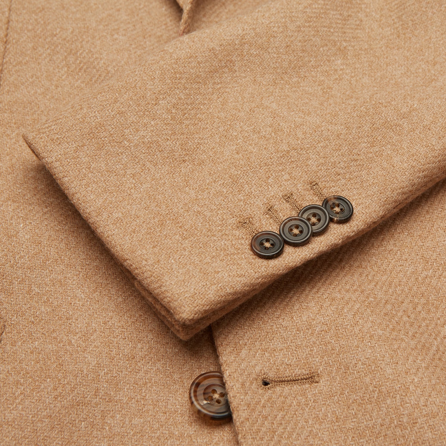 View 2 of product The Camel Merino Wool Blazer by Turnbull & Asser features a classic notch lapel, two front pockets, and two dark buttons. Shown against a white background.