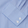 View 3 of product The Turnbull & Asser Powder Blue Stripe Tailored Fit Shirt features a Kent collar and 2-button cuffs, with powder blue and white vertical pinstripes, shown against a plain white background.