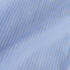 View 4 of product The Turnbull & Asser Powder Blue Stripe Tailored Fit Shirt features a Kent collar and 2-button cuffs, with powder blue and white vertical pinstripes, shown against a plain white background.