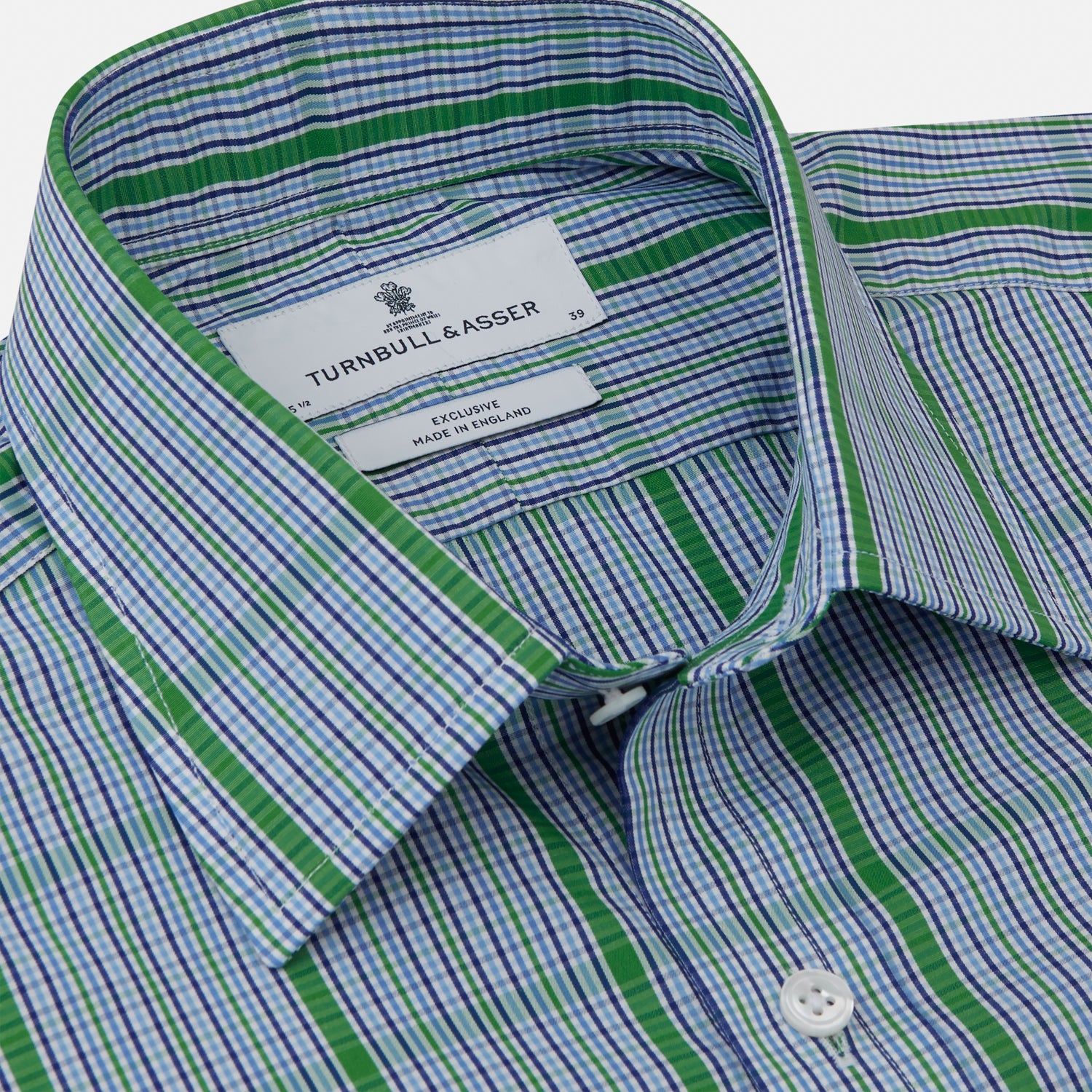 View 2 of product The Turnbull & Asser Green and Blue Fancy Check Regular Fit Shirt features a T&A collar and white buttons, displayed against a plain white background.