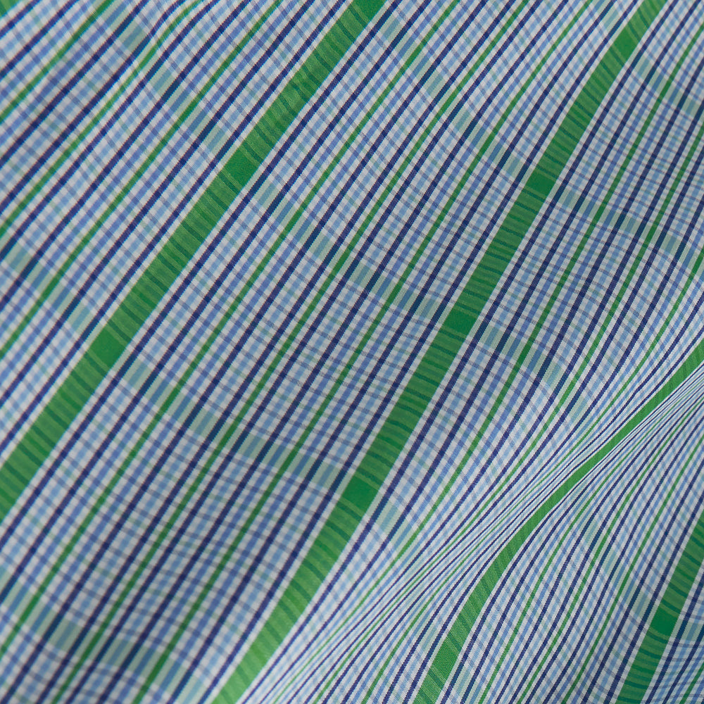 The Turnbull & Asser Green and Blue Fancy Check Regular Fit Shirt features a T&A collar and white buttons, displayed against a plain white background.