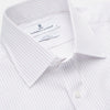View 2 of product The Turnbull & Asser Red & White Stripe Sea Island Quality Cotton Regular Fit Mayfair Shirt features a classic T&A collar, button-down front, and buttoned cuffs, shown laid flat on a white background.