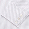 View 3 of product The Turnbull & Asser Red & White Stripe Sea Island Quality Cotton Regular Fit Mayfair Shirt features a classic T&A collar, button-down front, and buttoned cuffs, shown laid flat on a white background.