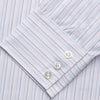 View 3 of product The Turnbull & Asser Blue Multi Stripe Regular Fit Mayfair Shirt features light blue vertical stripes on white, a classic collar, long sleeves, and buttoned cuffs, displayed on a plain white surface.