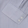 View 3 of product The Turnbull & Asser Blue Check Tailored Fit Shirt features a Kent collar, 2-button cuffs, and white buttons. Made from fine Italian cotton with a small blue and white checkered pattern, it's displayed on a plain white background.