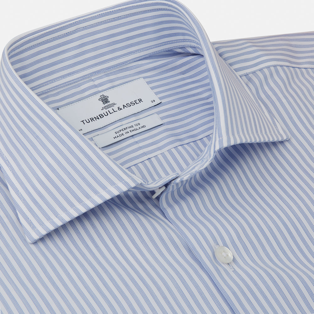 The Turnbull & Asser Sky Blue and White Stripe Tailored Fit Shirt features a Kent collar, 2-button cuffs, and is crafted from fine Italian cotton, shown flat against a plain background.