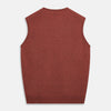 View 3 of product The Turnbull & Asser Burgundy Ifor Cashmere Slipover, a sleeveless V-neck design in fine knit, is shown laid flat on a white background; the neck lining displays a small label, highlighting its Scottish craftsmanship.