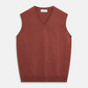 View 1 of product The Turnbull & Asser Burgundy Ifor Cashmere Slipover, a sleeveless V-neck design in fine knit, is shown laid flat on a white background; the neck lining displays a small label, highlighting its Scottish craftsmanship.