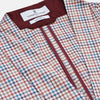 View 2 of product The Turnbull & Asser Burgundy Multi Check Cotton Kimono Gown is a knee-length robe with a burgundy check, red/blue/white pattern, long sleeves, a belt, and a solid burgundy inside collar.