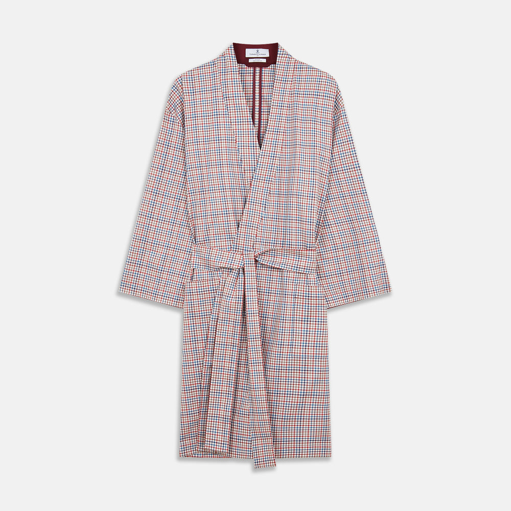 The Turnbull & Asser Burgundy Multi Check Cotton Kimono Gown is a knee-length robe with a burgundy check, red/blue/white pattern, long sleeves, a belt, and a solid burgundy inside collar.