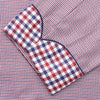 View 3 of product The Turnbull & Asser Burgundy Multi Check Contrast Cotton Gown features a long silhouette with a shawl collar, waist tie, and three pockets, accented by red, black, and white checkered trim—ideal for luxurious nights at home.