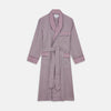 View 1 of product The Turnbull & Asser Burgundy Multi Check Contrast Cotton Gown features a long silhouette with a shawl collar, waist tie, and three pockets, accented by red, black, and white checkered trim—ideal for luxurious nights at home.