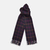 View 2 of product A man stands against a beige background wearing a rust sweater, dark pants, and a Turnbull & Asser Purple Multi Tattersall Check Cashmere Scarf, looking confidently at the camera with a neutral expression.